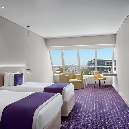 Leva Hotel Mazaya Centre Дубай Екстериор снимка